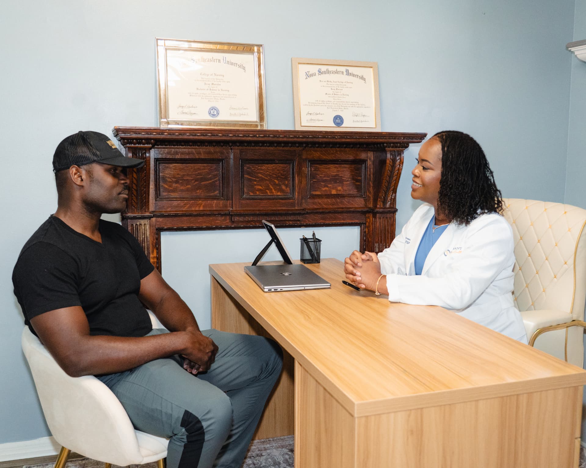 Provider consulting with a patient about hormone optimization
